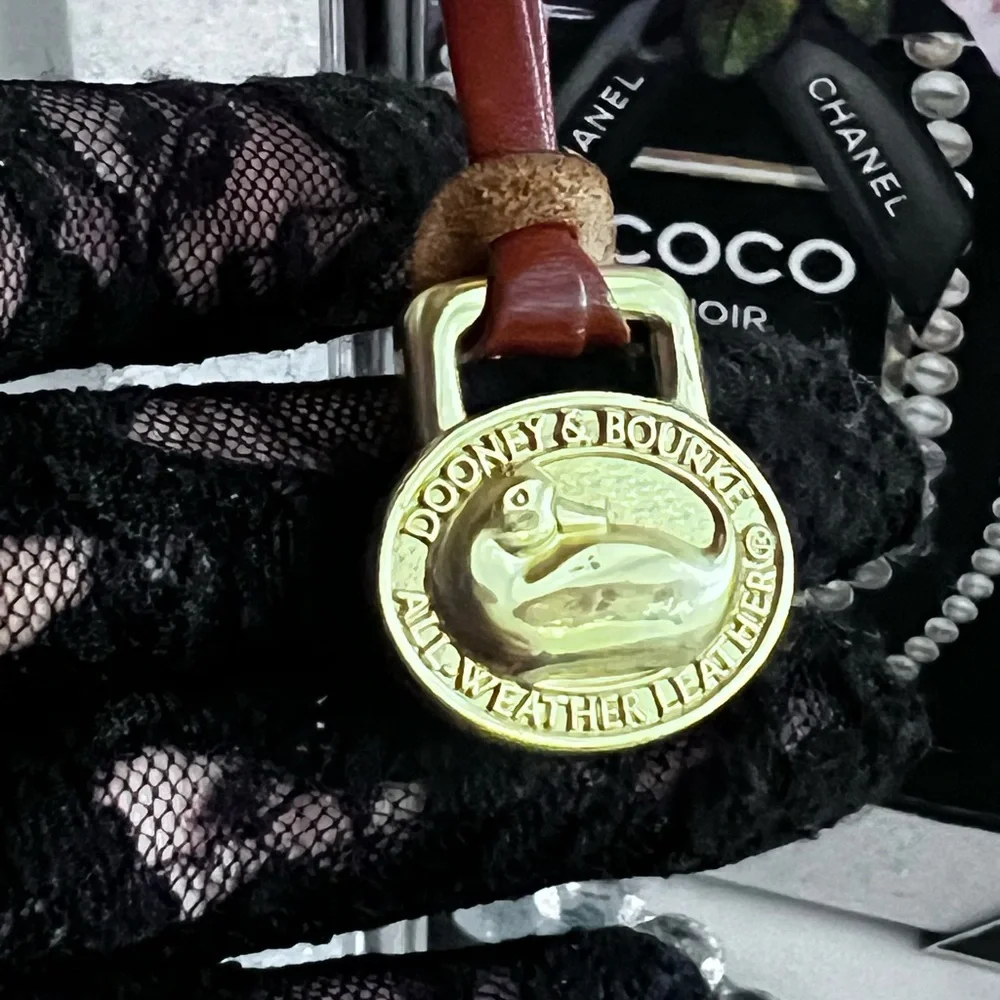 Dooney & Bourke  vintage Brown Leather Keychain with Gold Accent